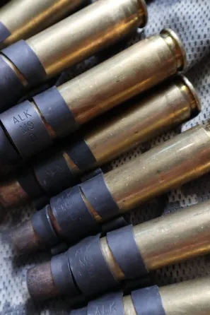 Сувенір стрічка кулеметна 12.7х99 14 гільз Харків